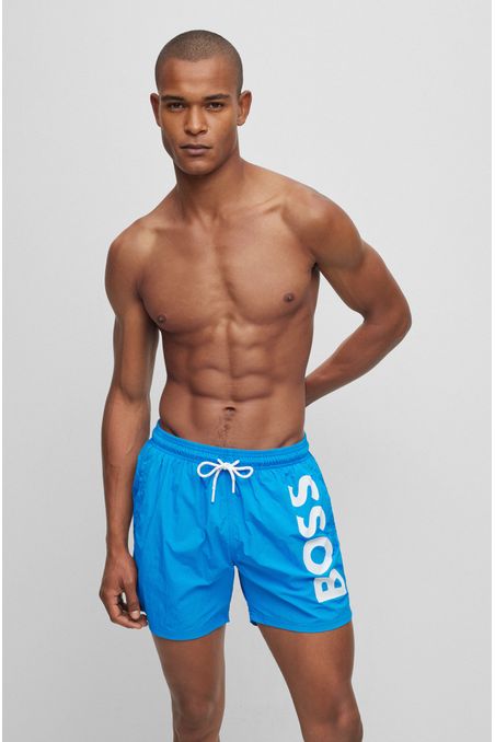 TRAJE DE BAÑO ESTILO SHORTS CON ESTAMPADO DE LOGOS HOMBRE