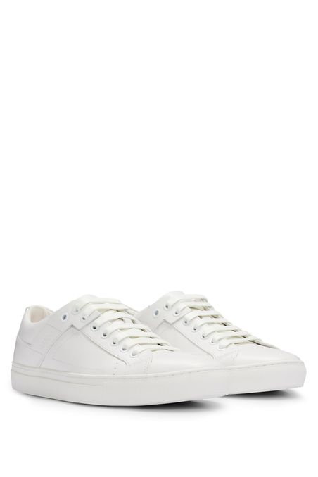 ZAPATILLAS DE PIEL CON CORDONES Y DETALLES DE LA MARCA HOMBRE