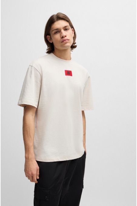 POLO RELAXED FIT HUGO X RB CON DETALLE DE LA MARCA HOMBRE