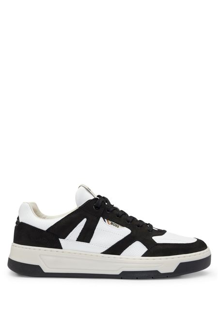 ZAPATILLAS CON PIEL Y DETALLES DE LA MARCA HOMBRE