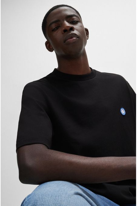 POLO REGULAR FIT DE PUNTO DE ALGODÓN CON LOGO HOMBRE