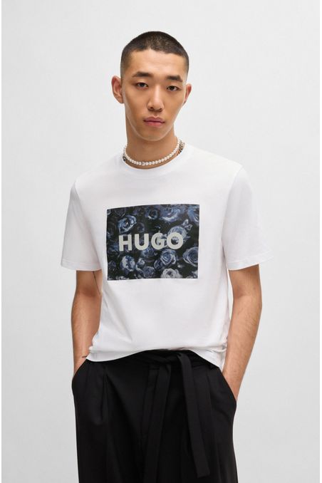 POLO REGULAR FIT DE PUNTO DE ALGODÓN CON ILUSTRACIÓN DE TEMPORADA HOMBRE