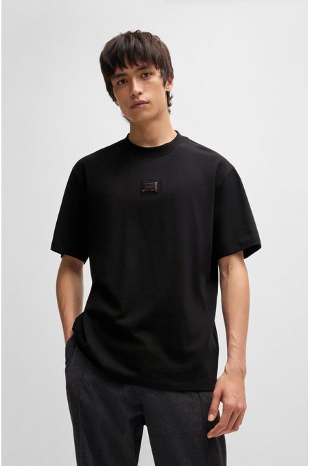 POLO RELAXED FIT EN PUNTO DE ALGODÓN CON PARCHE DE LOGO HOMBRE