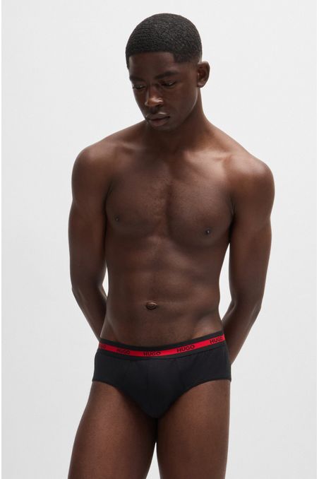 PAQUETE DE TRES CALZONCILLOS SLIP DE ALGODÓN ELÁSTICO CON LOGOS EN LA CINTURA HOMBRE