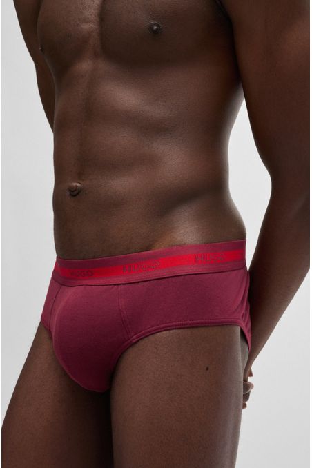 PAQUETE DE TRES CALZONCILLOS SLIP DE ALGODÓN ELÁSTICO CON LOGOS EN LA CINTURA HOMBRE