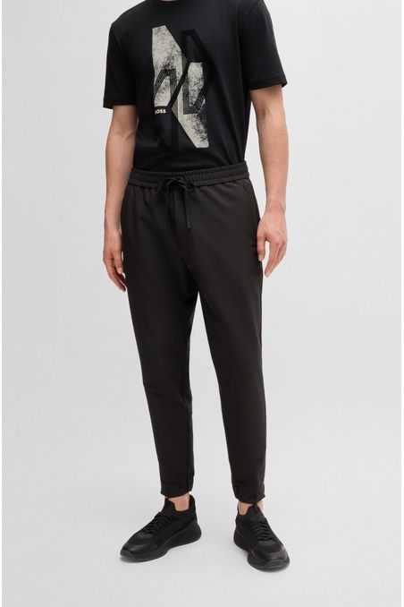 PANTS TAPERED FIT EN TEJIDO MULTIELÁSTICO HOMBRE