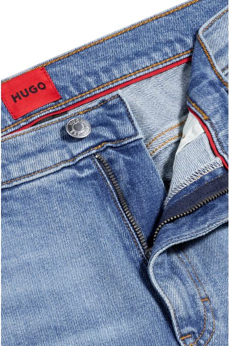 JEANS EXTRA SLIM FIT EN UN CÓMODO DENIM ELÁSTICO AZUL CLARO JEANS EXTRA-SLIM FIT HOMBRE