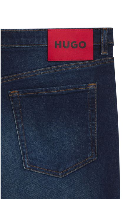 JEANS TAPERED FIT DE DENIM ELÁSTICO AZUL OSCURO JEANS TAPERED FIT HOMBRE