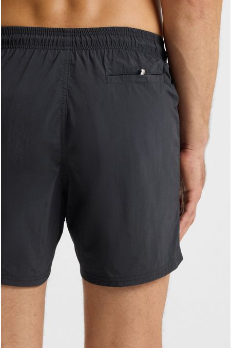 TRAJE DE BAÑO CON LOGO ESTAMPADO VERTICAL TRAJE DE BAÑO HOMBRE