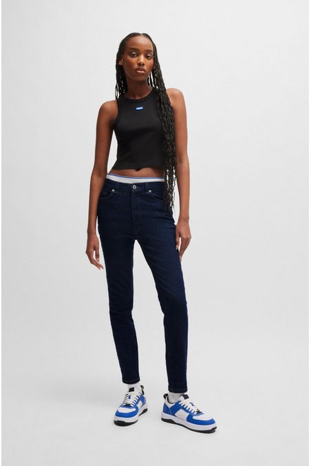 JEANS SKINNY FIT EN DENIM ELÁSTICO AZUL OSCURO JEANS SKINNY FIT MUJER